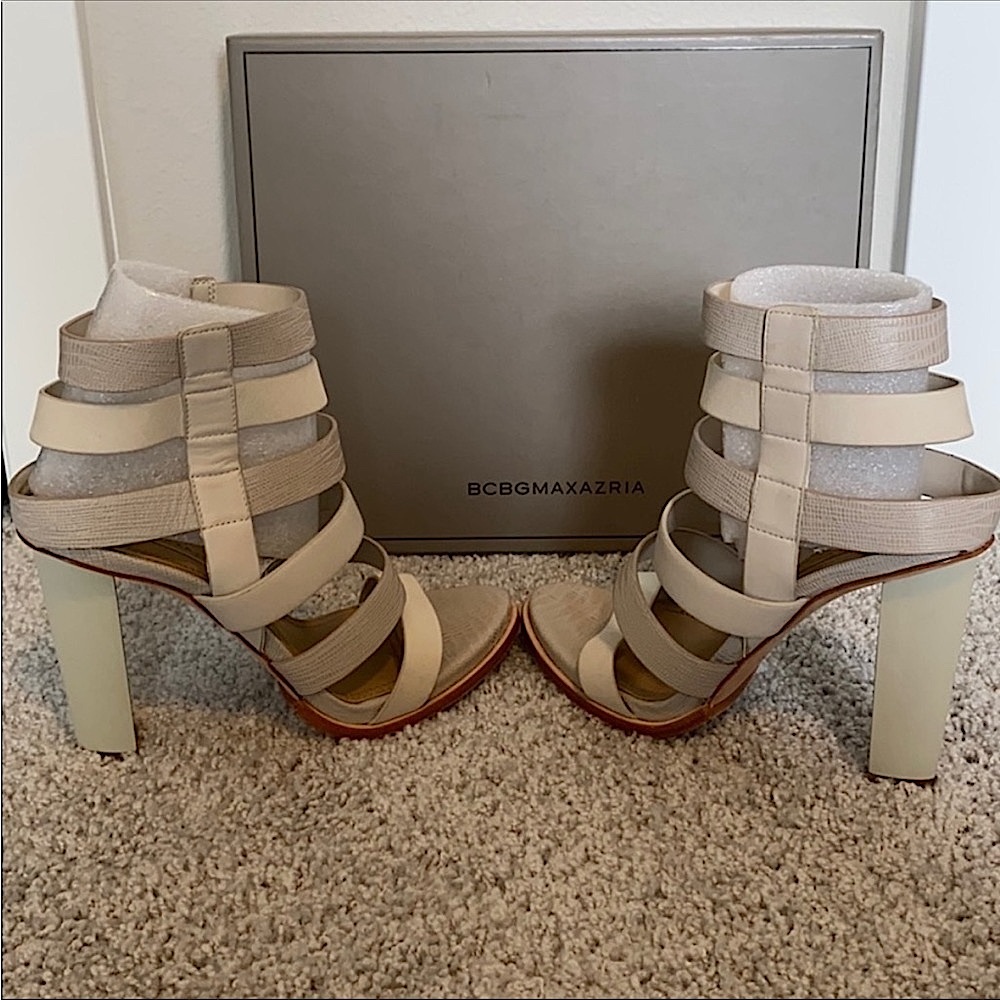 BCBGMAXAZRIA two-tone leather cage sandal with embossed lizard straps.